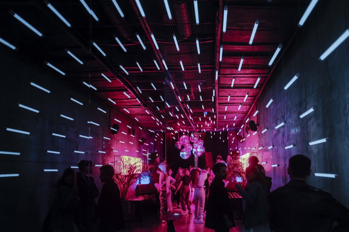 Dancers under neon light